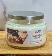 Load image into Gallery viewer, Jar candle labeled &#39;Sugar Plum Danish&#39; on a wooden surface with a neutral background
