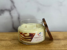 Load image into Gallery viewer, Jar candle labeled &#39;Maple Walnut Pancake&#39; on a wooden surface with a marble background
